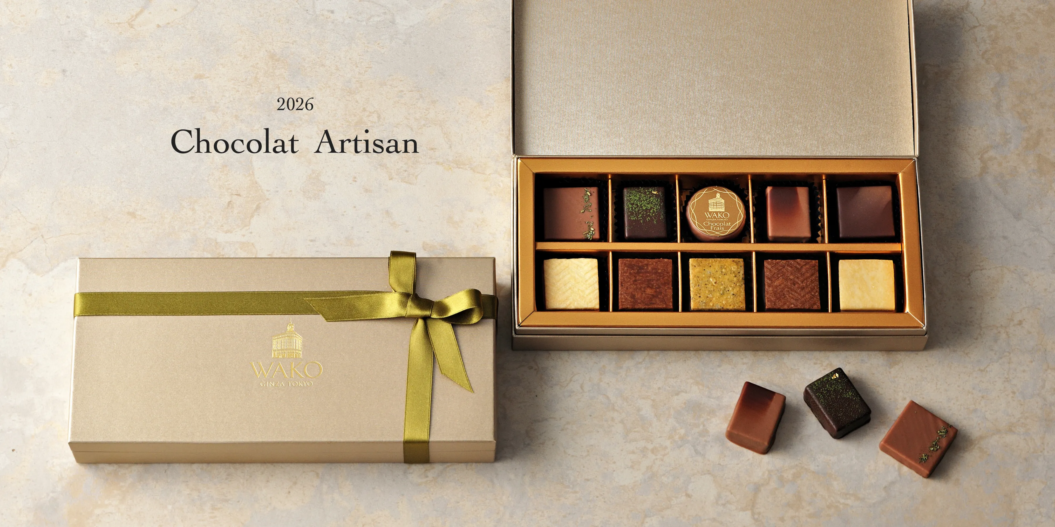 2026 ショコラアルチザン 日本茶やクッキーなど10種のフレーバーが美しく並ぶショコラフレ スペシャリテが背景に大きく写るメインビジュアル